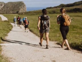 Photo of hikers on the Camino de Santiago from the REI blog