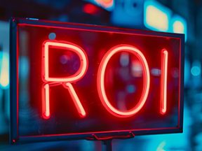 Photo of "ROI" on a neon sign