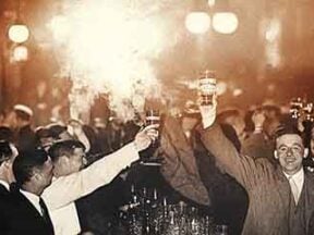 Photo of celebrators in the 1930s in a bar