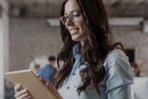 Photo from Litmus of a female holding a tablet computer