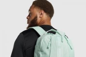 Image from Gymshark of a male wearing a backpack