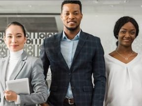 Image of three office workers: 2 females and 1 male