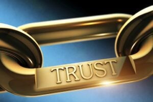 Illustration of a chain link with the word "trust" on it