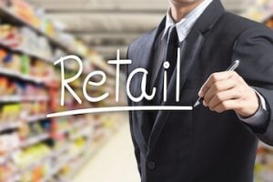 Photo of a male in a retail store with "Retail" superimposed on the image