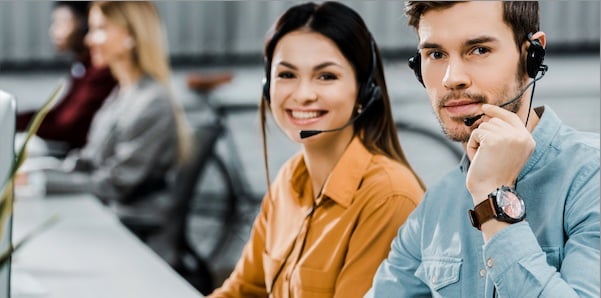 Male and female on headsets.