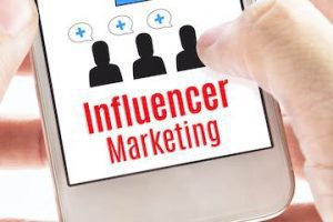 Screenshot of a smartphone screen that reads "influencer marketing"