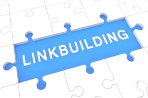 Illustration of the word "linkbuilding" in a jigsaw puzzle