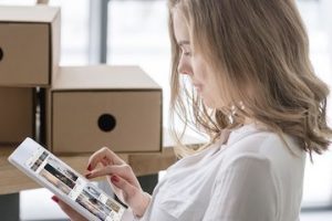 Female holding a tablet computer