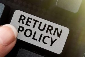 Image of a keyboard with "Return Policy" superimposed on the return key