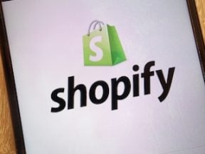 Shopify logo on a smartphone