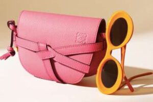 Image of a purse and sunglasses from Vestiarire Collective