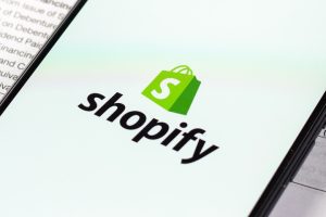 Shopify logo on a smartphone